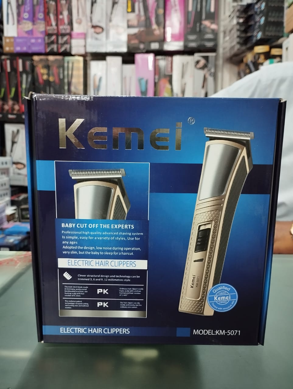 Kemei KM-5071 Powerful Rechargeable Hair Clipper Low Noise Hair Trimmer with 4 combs